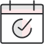 icon of a desk calendar with a tick on the page