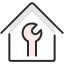 icon for home renovation- a house with a wrench